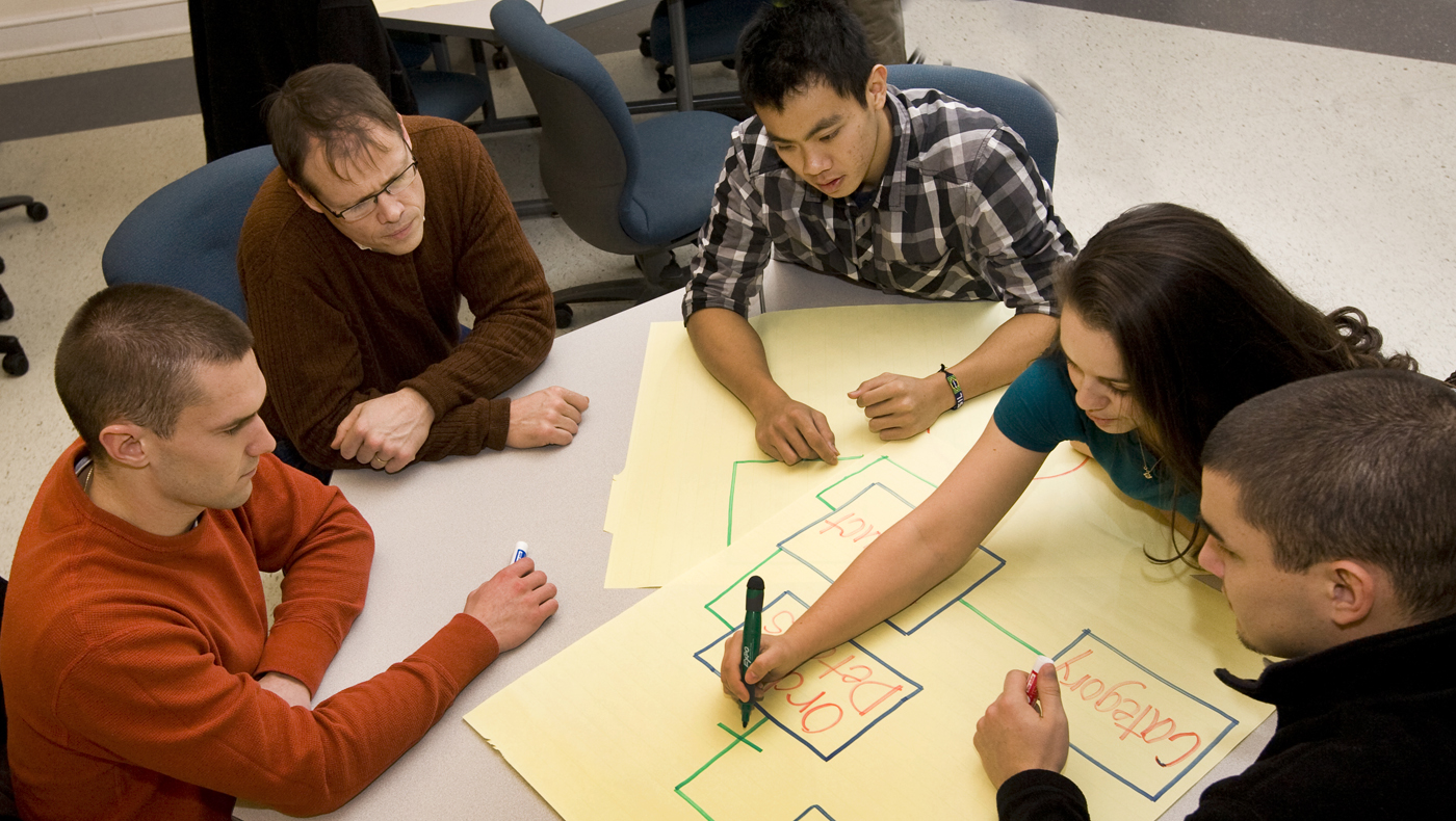 A group of graduate students working on a project.