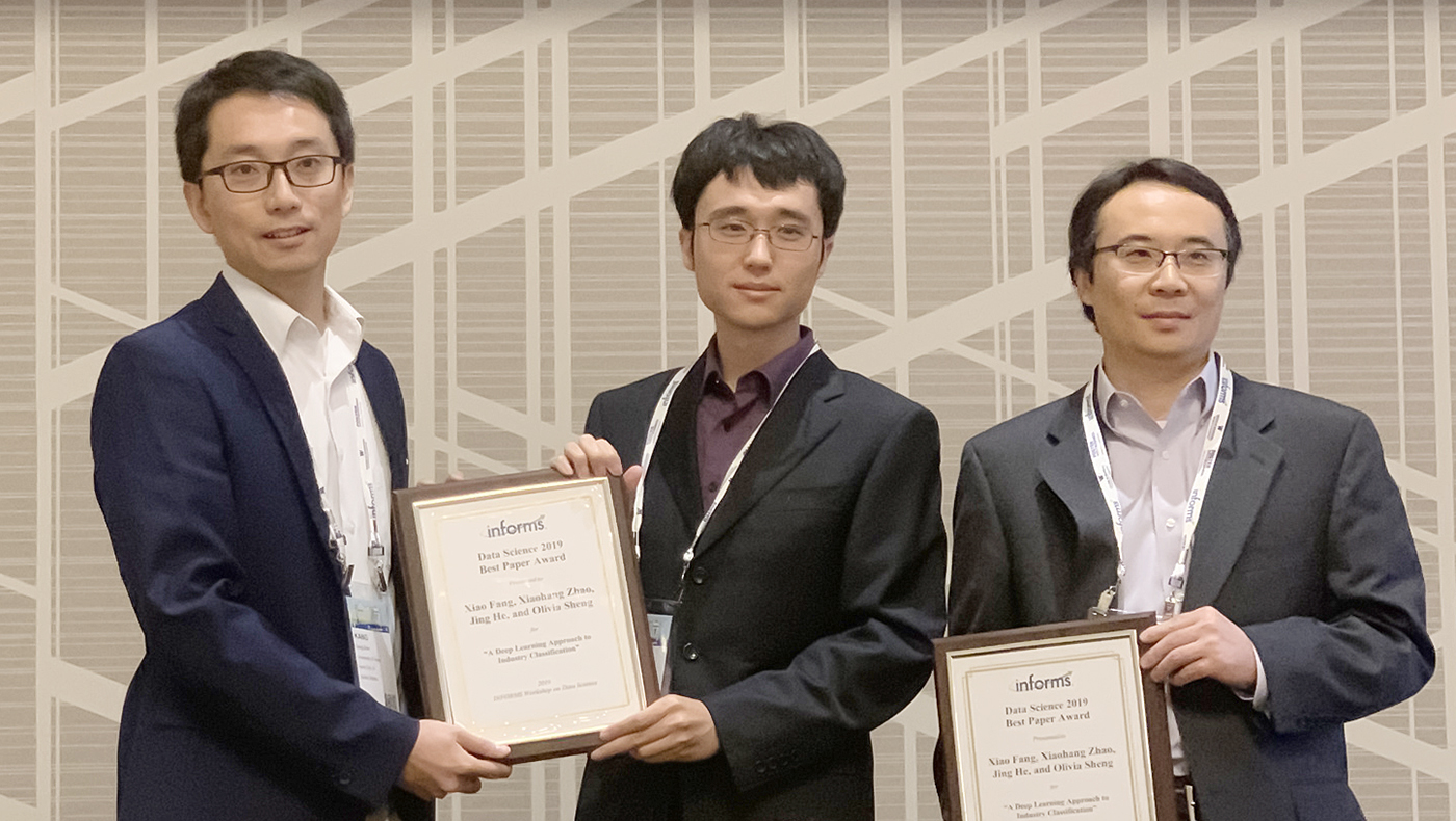 FSAN paper authors hold best paper awards