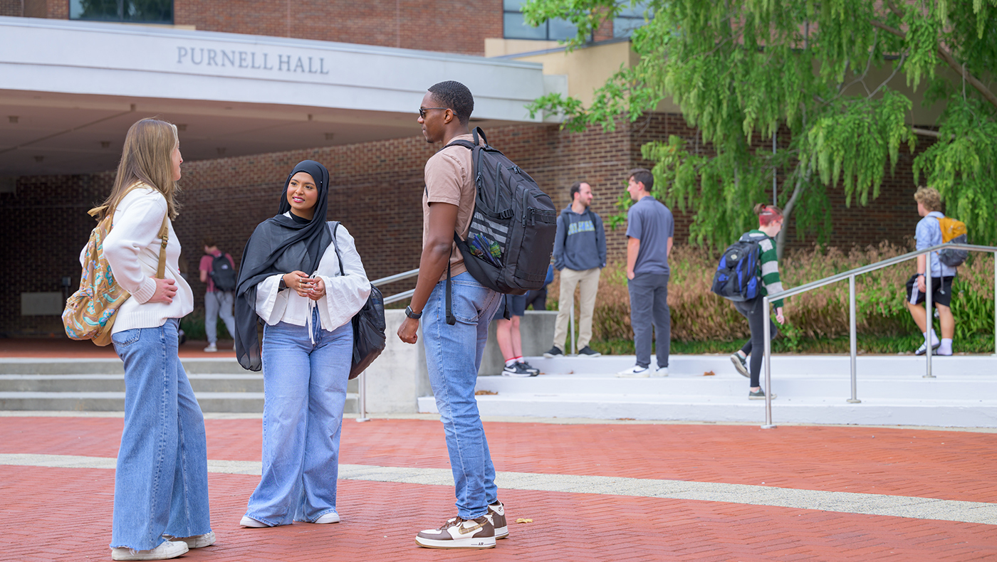 Lerner students outside of Purnell Hall on the University of Delaware campus.