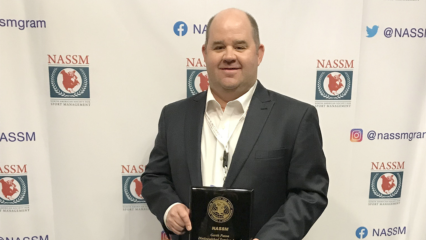 Tim DeSchriver accepts his NASSM 2019 Dr. Garth Paton Distinguished Service Award
