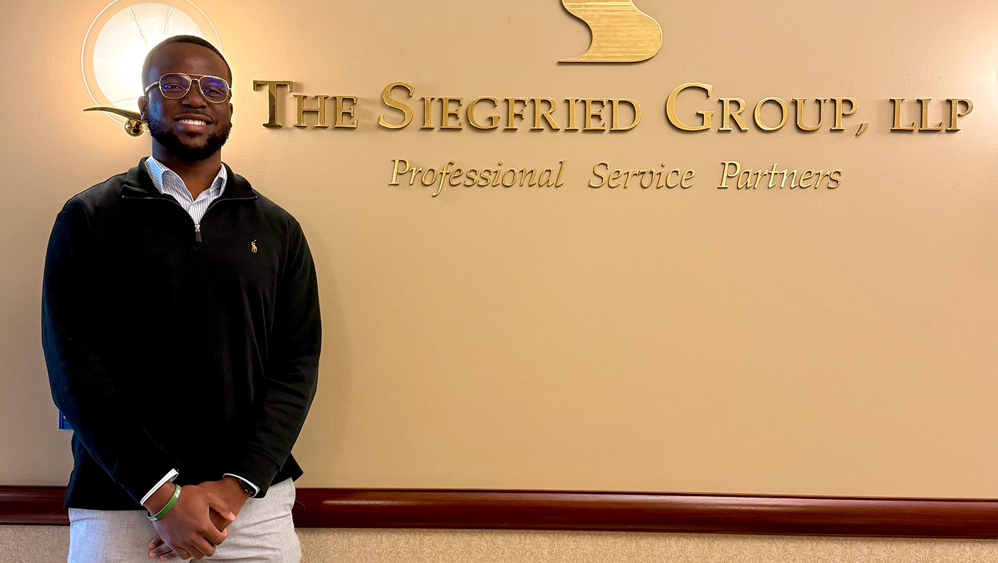 TyShawz Elzey at The Siegfried Group office.