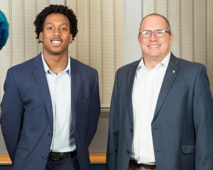 Pictured (l to r) Christopher Pierce, Class of 2024, finance major and Greg Sawka, president and CEO of Bancroft Construction Company.