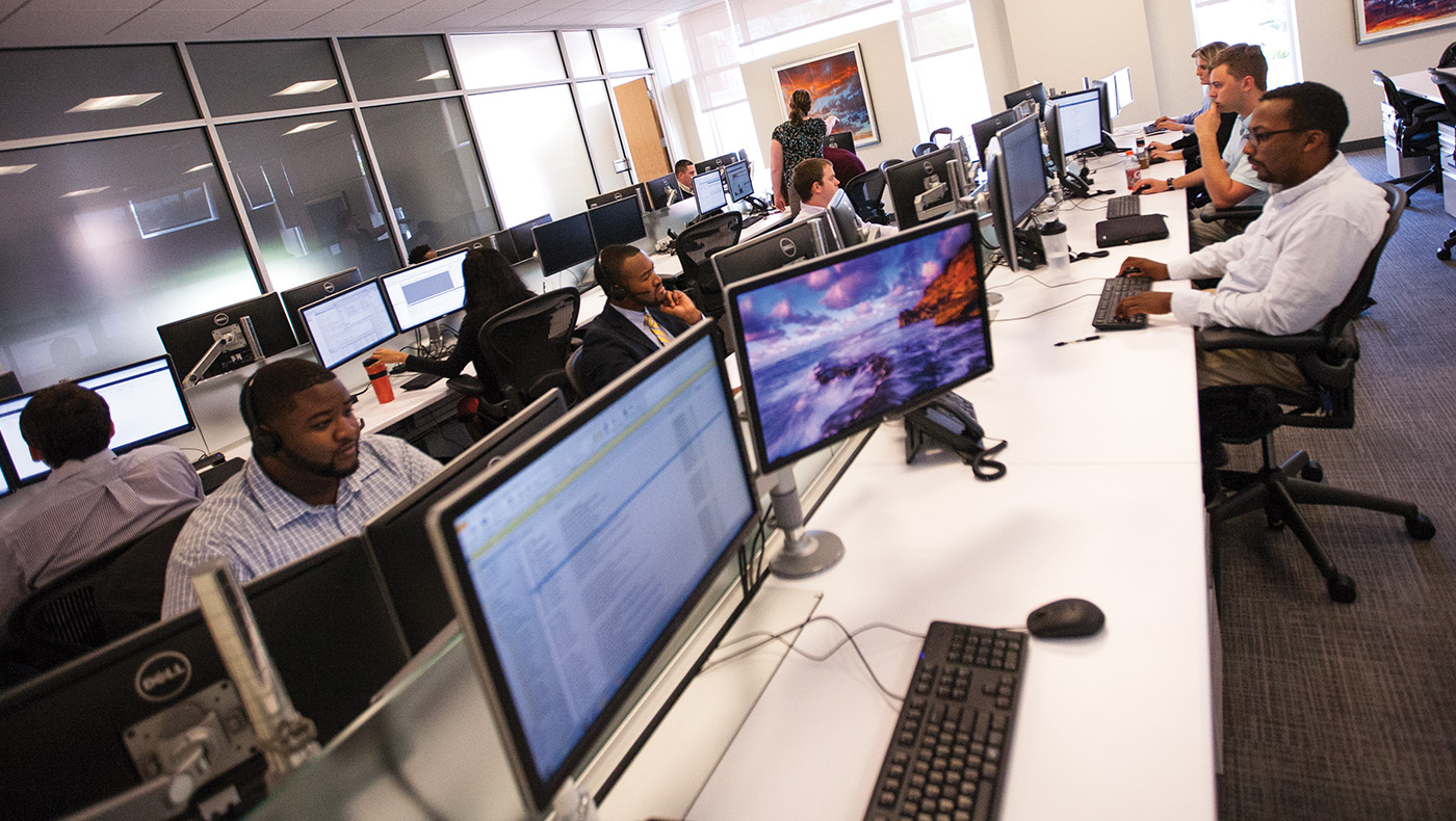 graduate students working on computers in the JPMorgan Center