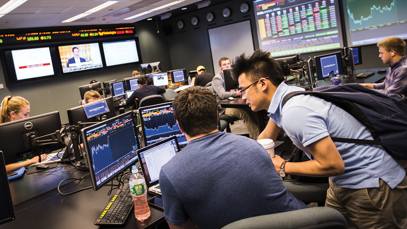 Students working the trading lab